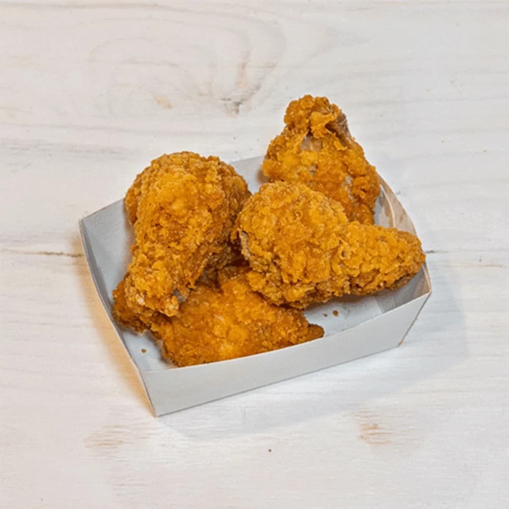 Drie stuks, krokant gefrituurd. Klein bijgerecht, groot verschil.