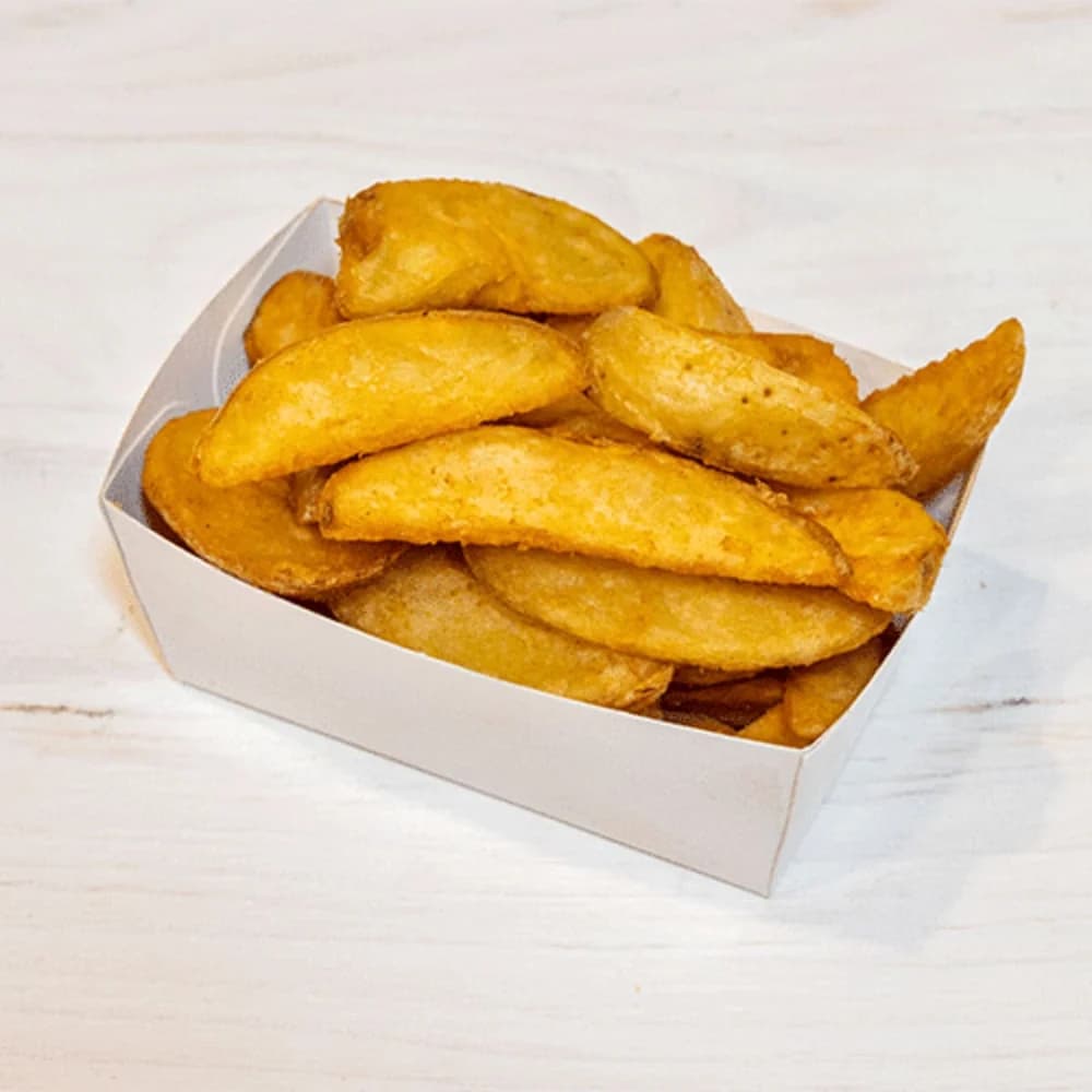 Een portie potatoes met de schil eraan, gekruid gebakken. Steviger dan frieten.